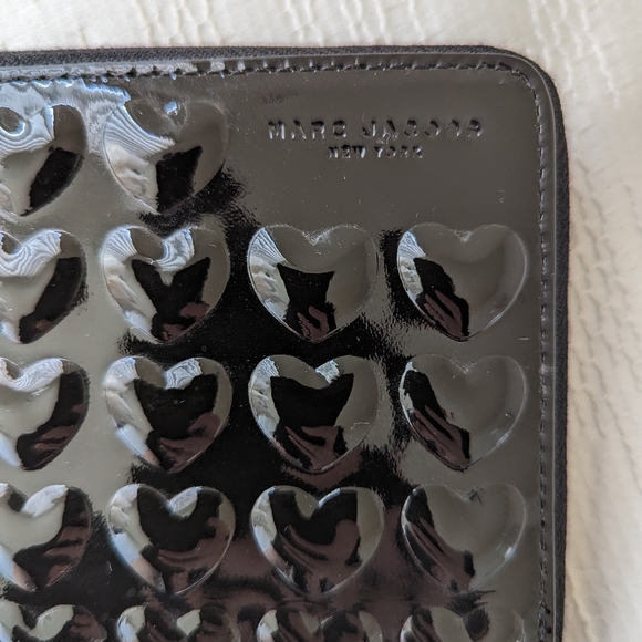 Marc Jacobs Handbags - Marc Jacobs Embossed Heart Phone Wristlet wallet